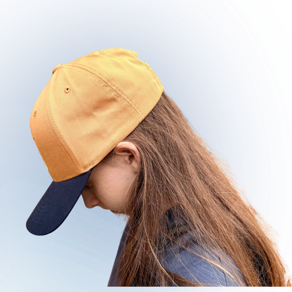 Hat: Primary logo (Wheat/Navy)