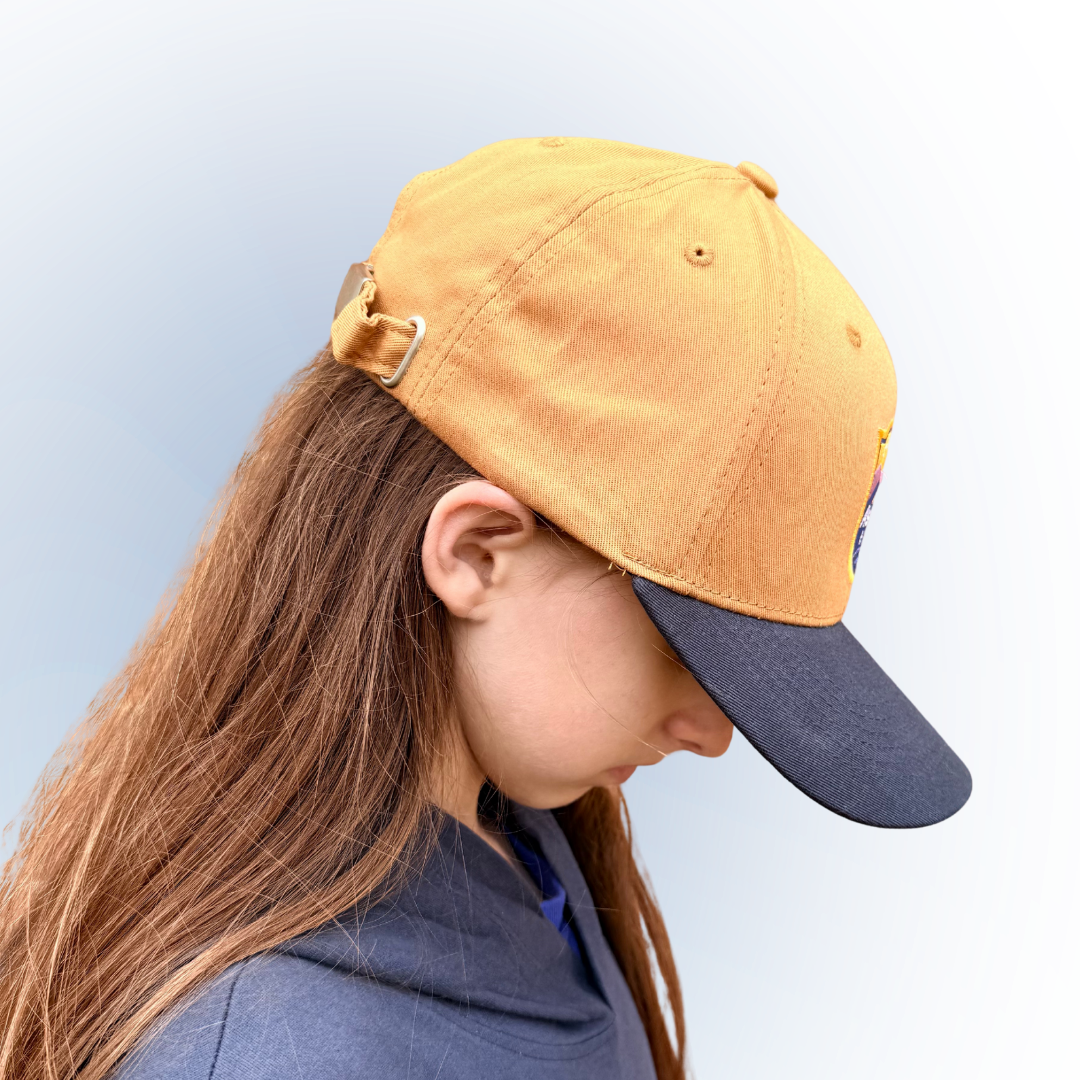 Hat: Primary logo (Wheat/Navy)